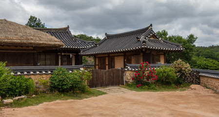 Typical korean traditional style country side buildings with farmyard in Yangdong Folk Village in typical landscape. Gyeongju, South Korea, Asia.
