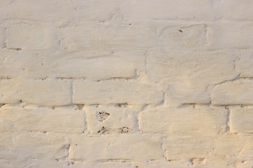 Photo of beige brickwork in sun glare