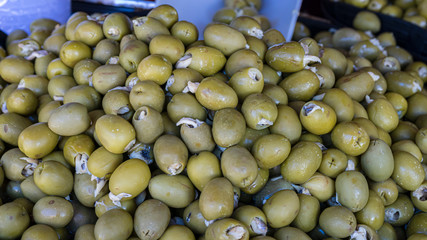 Olives stuffed with anchovy, typical Spanish food, pickles in vinegar