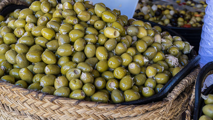 Olives stuffed with anchovy, typical Spanish food, pickles in vinegar