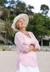 Senior woman relaxing at seaside