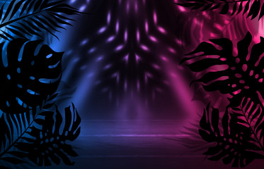 Fototapeta na wymiar Background of empty dark scenes with neon lights and shapes, smoke. Silhouettes of tropical palm leaves in the foreground. Bright futuristic abstract background