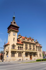 Fototapeta na wymiar Architectural detail on Napajedla town hall exterior built in 1903 near Zlin, Moravia, Czech Republic, sunny summer day
