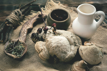 Witch doctor table with various dried ingridients above. Witchcraft concept.