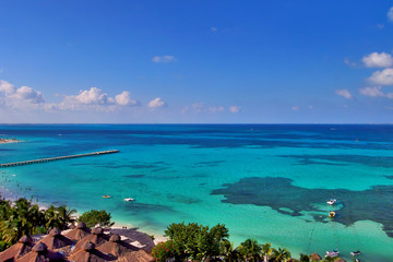 High angle view of the turquoise colored Caribbean sea in Cancun, Mexico.