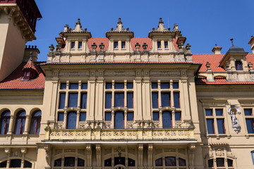 Obraz premium Architectural detail on Napajedla town hall exterior built in 1903 near Zlin, Moravia, Czech Republic, sunny summer day