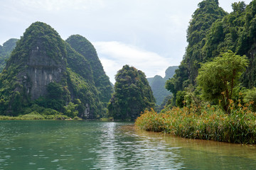 Landscape with karst mountains and river, Ninh Binh, Trang An, Vietnam.