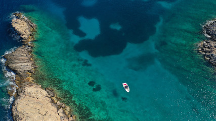 Aerial photo of tropical Caribbean bay with white sand beach and beautiful turquoise and sapphire clear sea