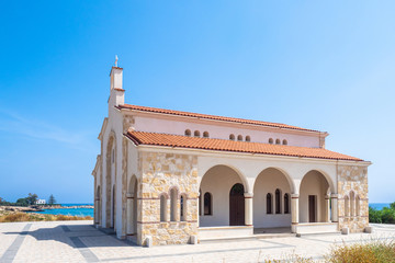 Fototapeta na wymiar Cyprus. Protaras. The chapel of Apostle Andreas Potorytsia in Protaras. Cyprus temples. Mediterranean architecture. Tourist iconic landmarks of Protaras.