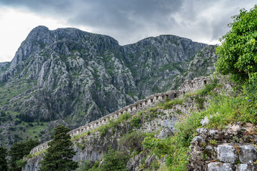 Stone walls of Kotor Fortress above the old town in Montenegro