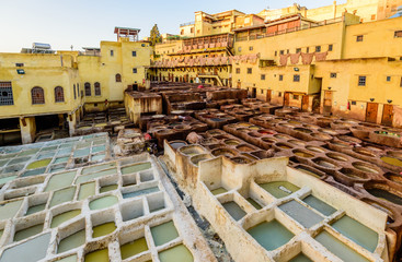 Sightseeing of Morocco. Tanneries of Fez. Dye reservoirs and vats in traditional tannery of city of...