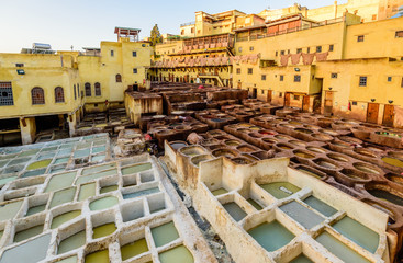 Sightseeing of Morocco. Tanneries of Fez. Dye reservoirs and vats in traditional tannery of city of Fez, Morocco