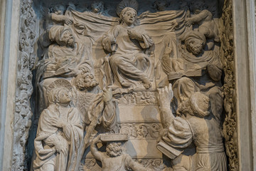 Avila, Spain - April 17, 2019. Interior of the Cathedral of Avila during the celebration of Holy Week in Spain. Biblical scenes in relief