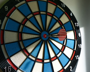 dartboard with dart in center