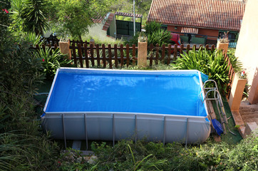 swimming pool in holiday home garden in southern France