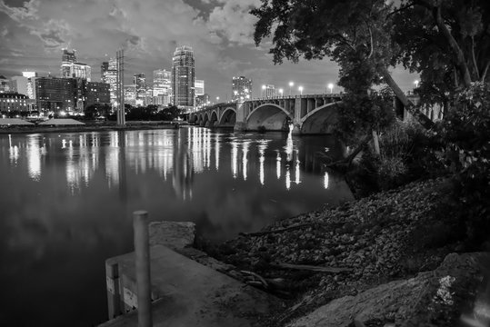 Fototapeta urban skyline along the river at night