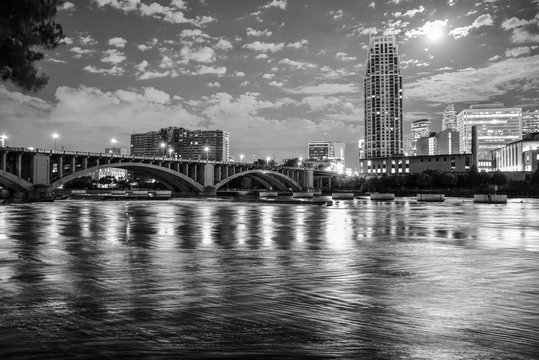 Fototapeta urban skyline along the river at night