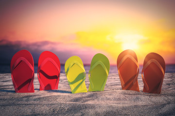 Bright flip flops on beach - obrazy, fototapety, plakaty