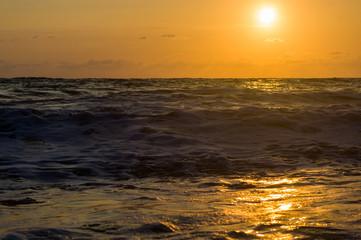 Amazing sea sunset, the sun, waves, clouds