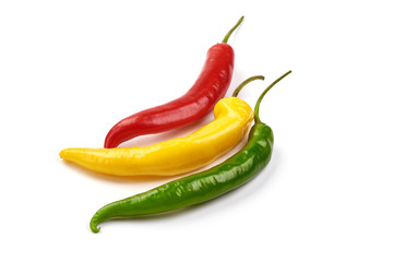 Red hot chili pepper mix, close-up, isolated on white background