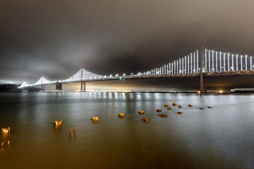 Panoramic view of the Bay Bridge from the Port of San Francisco. The Embarcadero, San Francisco, California, USA.