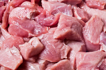 The pieces of raw meat closeup
