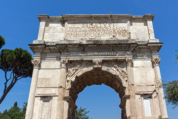 Fototapeta na wymiar Arch of Titus in Roman Forum in city of Rome, Italy