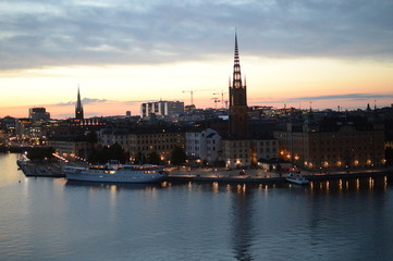 Fototapeta na wymiar sweden, stockholm, sunset, cityhall, riddarholmen