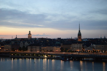 Fototapeta na wymiar sweden, stockholm, sunset, cityhall, riddarholmen