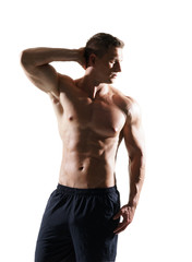 Obraz premium Strong, fit and sporty bodybuilder man over white background.