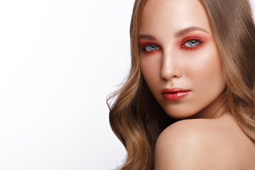 Fototapeta premium Beautiful fresh girl with perfect skin, bright red make up. Beauty face.