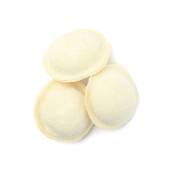 Fototapeta na wymiar Frozen raw dumplings on white background, top view