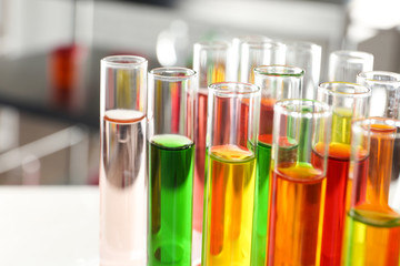 Test tubes with samples in chemistry laboratory, closeup