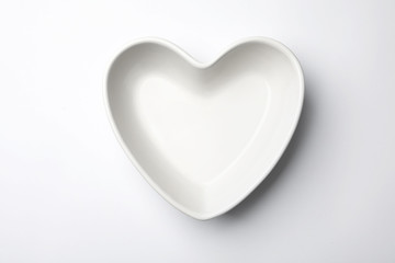 Clean empty plate on white background, top view