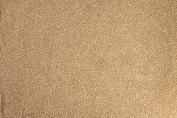 Fototapeta na wymiar Sand texture. Sandy beach for background. Top view
