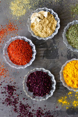 Colourful various herbs and spices for cooking on isolated background