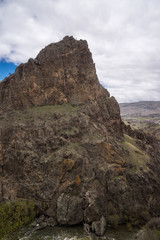 tmogvi fortress with mountain and river panorama