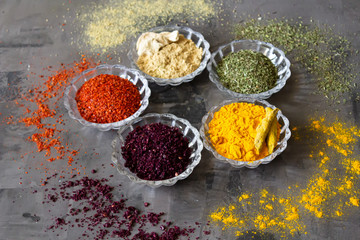 Colourful various herbs and spices for cooking on isolated background
