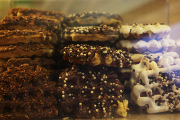 display of delicious looking cakes in a street bar, close up