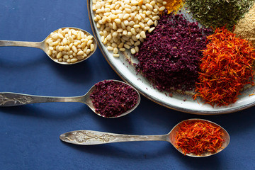 Colourful various herbs and spices for cooking on isolated background
