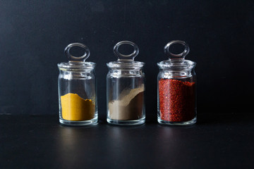 Colourful various herbs and spices for cooking on isolated background