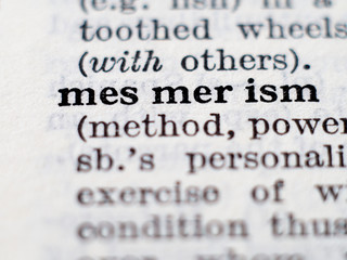 Obraz premium Dictionary definition of word mesmerism. Selective focus.