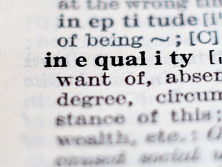 Obraz premium Dictionary definition of word inequality. Selective focus.