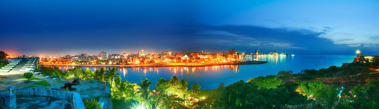 panoramic view of the city of habana and its bay seen from the castle of morro at nightfall