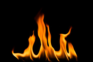 The flame is burning on a black background - image