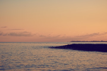 Beautiful seascape with orange sunset.