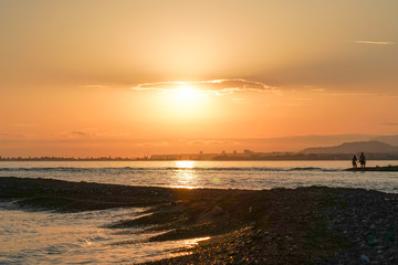 Beautiful seascape with orange sunset.