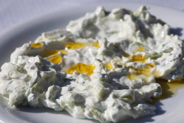 National Greek food - tzatziki served on a white plate