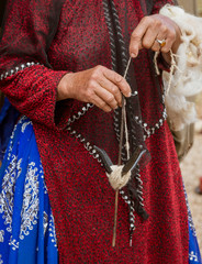 Iranian Hill Tribe Woman Spins Goat Wool - Close-up.