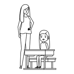 student girl in school desk with female teacher